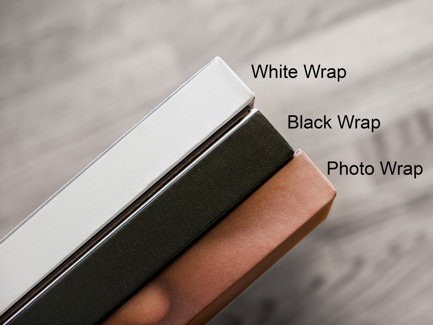 Three gallery wrapped canvases showing the border options - solid white, solid black, and photo wrapped
