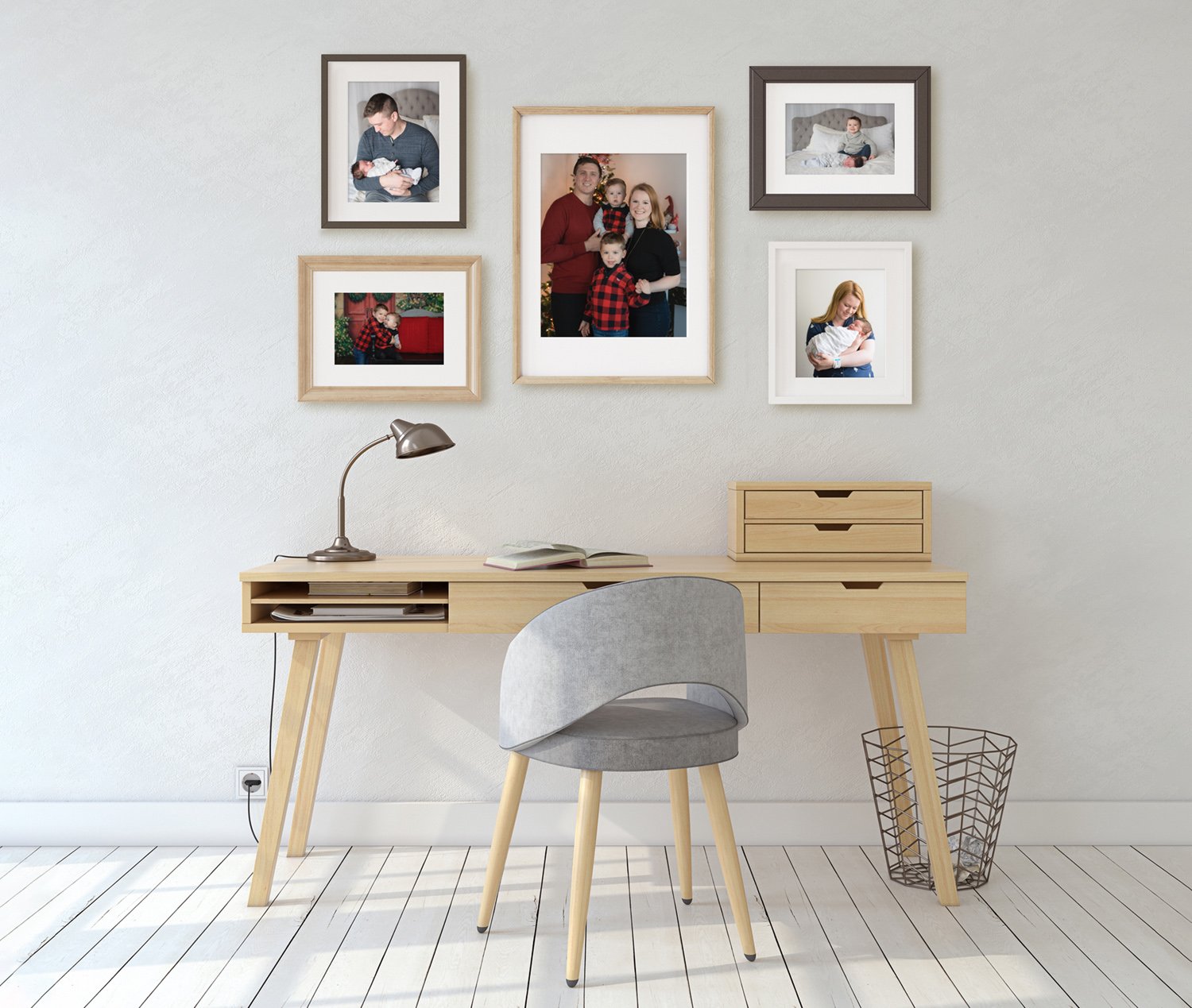 Example of a gallery wall in a home office with a large central photo surrounded by smaller photos