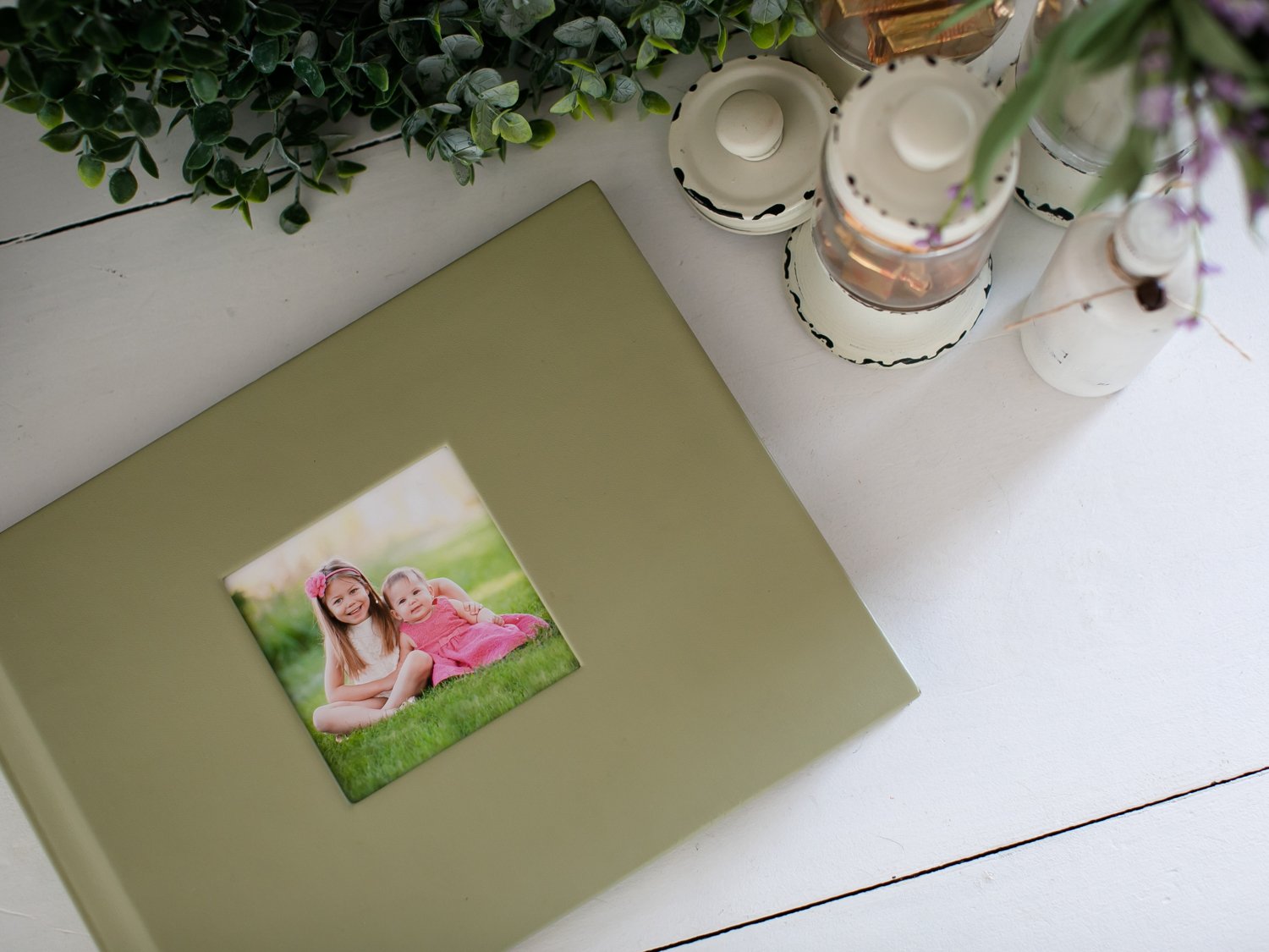 Photo album with a green cover