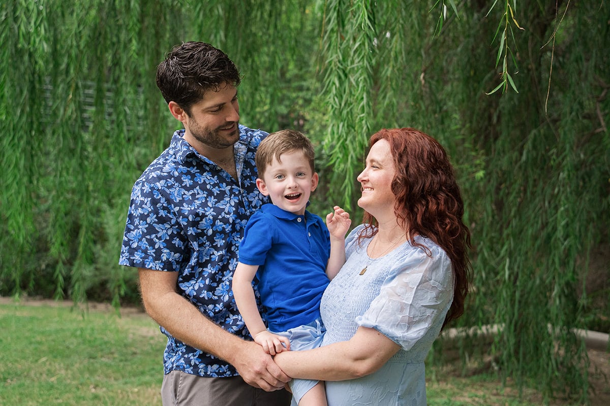 Parents and their child in a park Parents and their child in a park