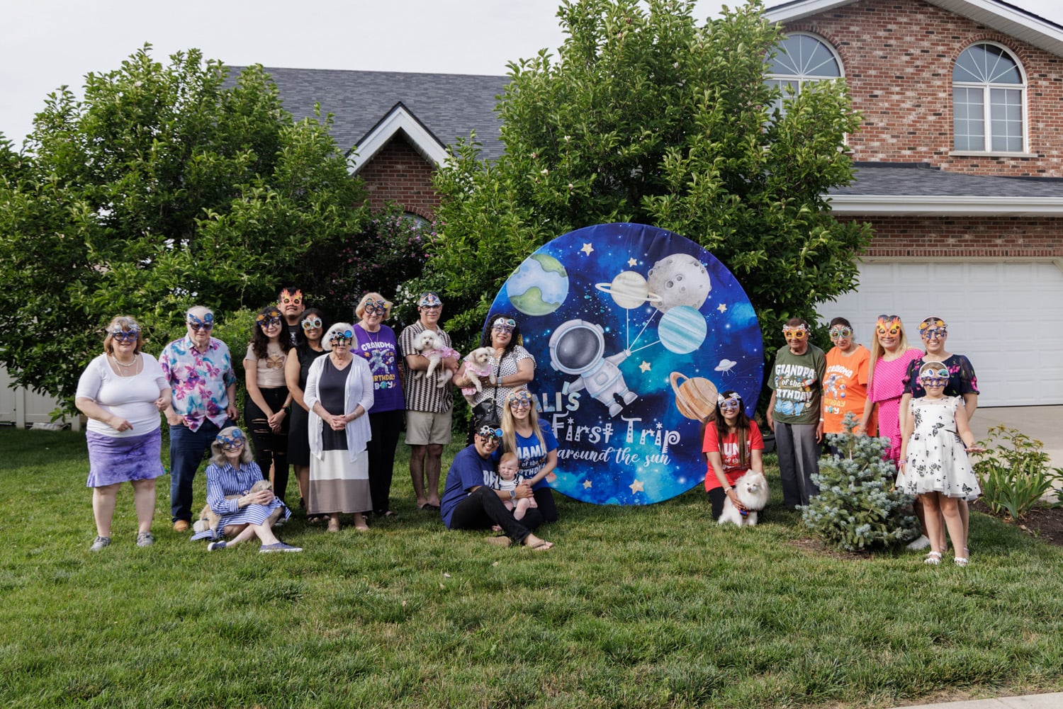 Family at a party celebrating their child's first birthday