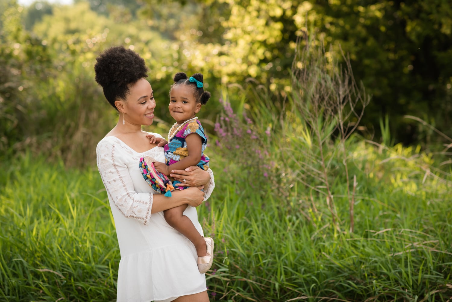 Mother holding her child during a lifestyle portrait session