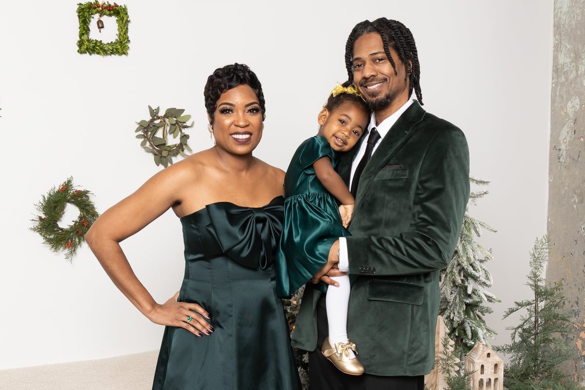 Family posing together during a Christmas themed studio session